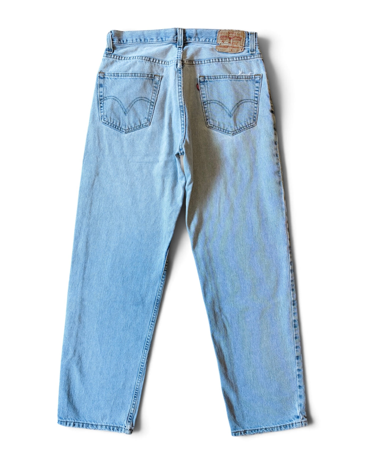 Vintage 2000s Levi’s 550 Relaxed Fit Faded & Distressed Light Wash Jeans