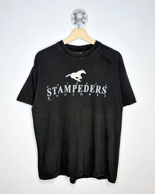 Vintage Early 2000s Calgary Stampeders Black Faded Tee Shirt
