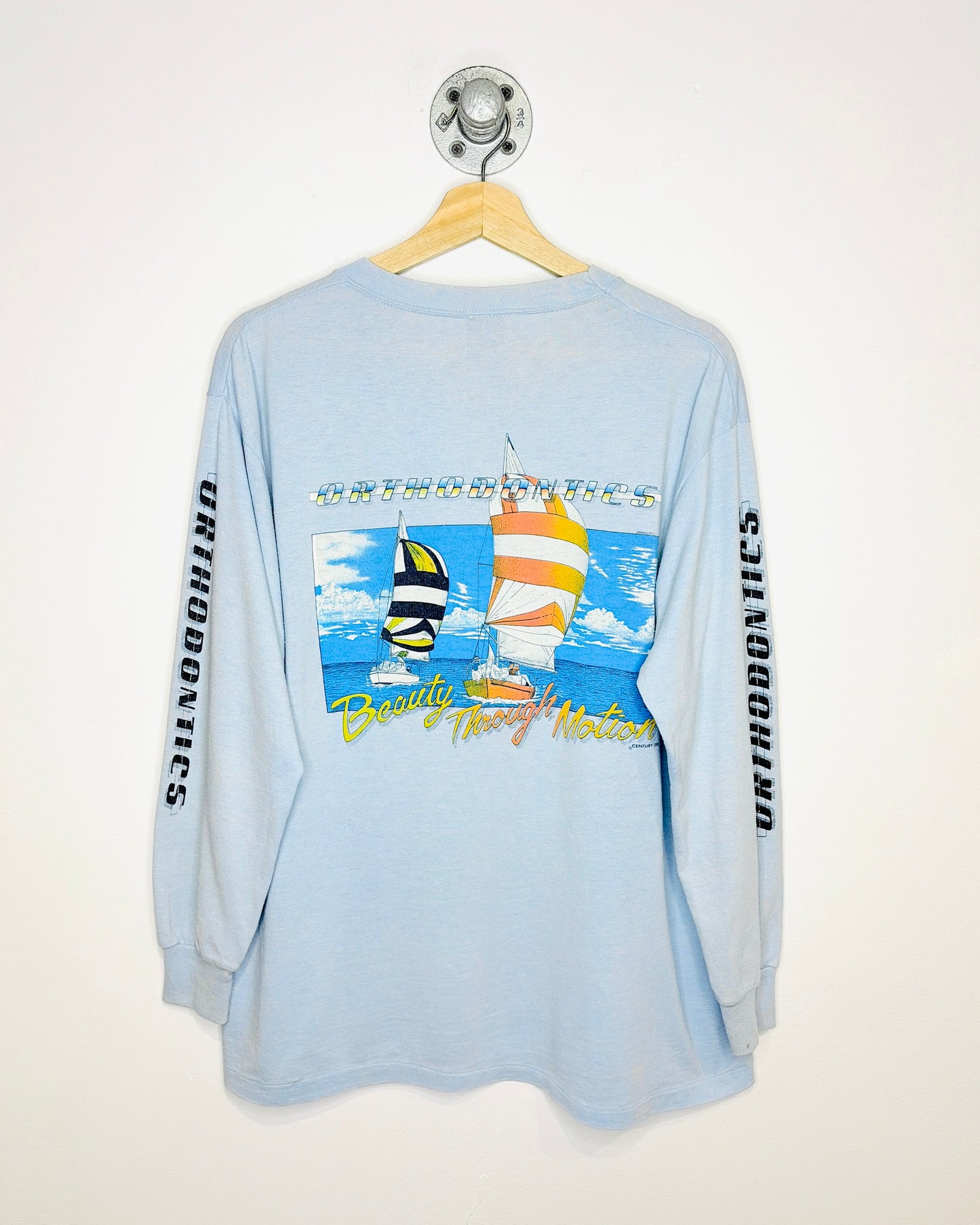 Vintage 80s Orthodontics Beauty Through Motion Light Blue Longsleeve Shirt