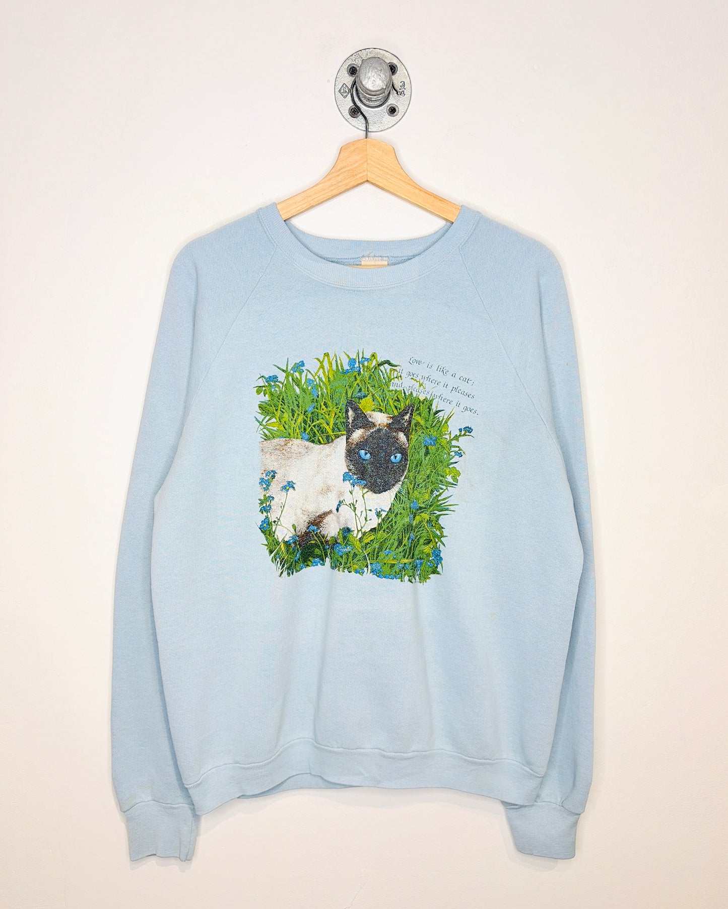 Vintage 80s “Love Is Like A Cat” Light Blue Raglan Crewneck Sweatshirt
