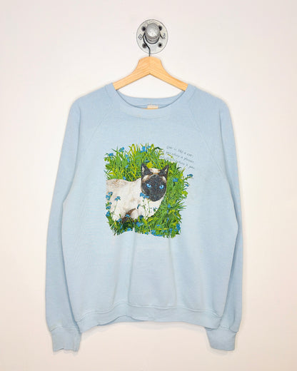 Vintage 80s “Love Is Like A Cat” Light Blue Raglan Crewneck Sweatshirt
