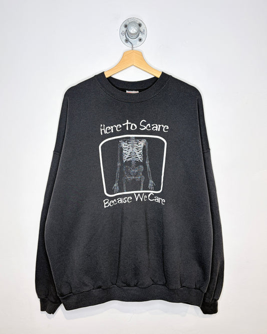 Vintage 2000s “Here To Scare Because We Care” Team Radiology Faded Black Crewneck Sweatshirt