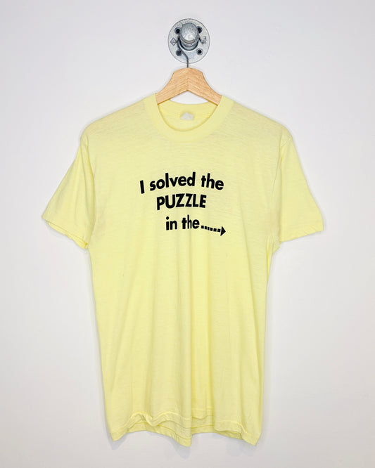 Vintage 70s “I Solved The Puzzle In The Staten Island Advance” Paper Thin Pale Yellow Tee Shirt