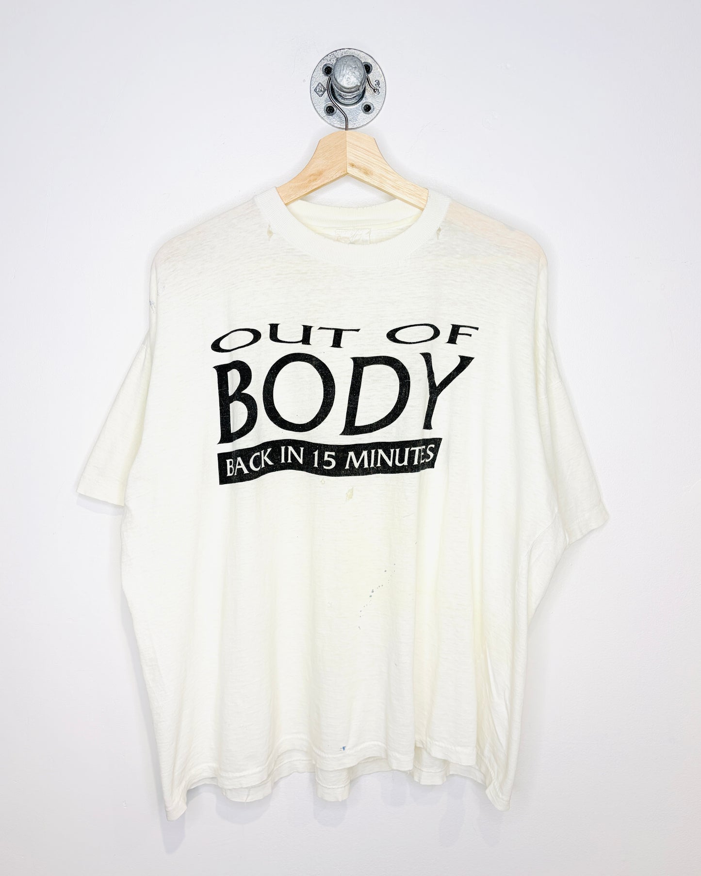 Vintage 90s “Out Of Body” Thrashed & Paper Thin White Tee Shirt