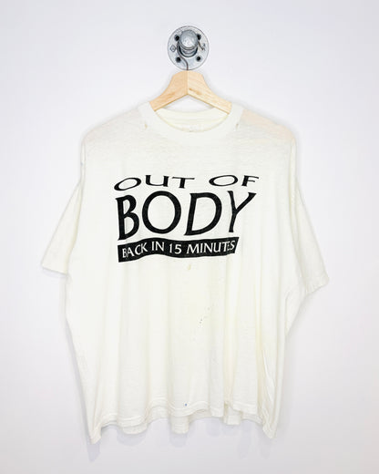 Vintage 90s “Out Of Body” Thrashed & Paper Thin White Tee Shirt