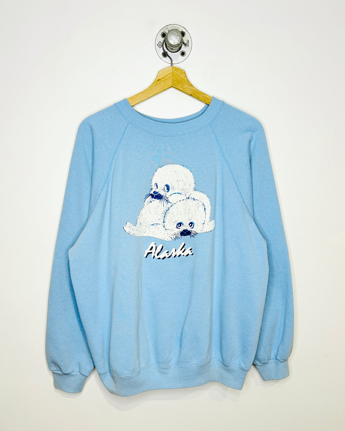 Vintage 80s Alaska Baby Harp Seals Puff Print Light Blue Raglan Crewneck Sweatshirt
